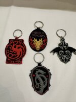 Schlüsselanhänger 6 cm House of the Dragon Game of Thrones Mini Anhänger Geschenk Cartoon Schlüsselanhänger Silikon Schlüsselanhänger für Handyhülle Charme Rucksack Geschenk Wappen Haus Targaryen grau schwarz